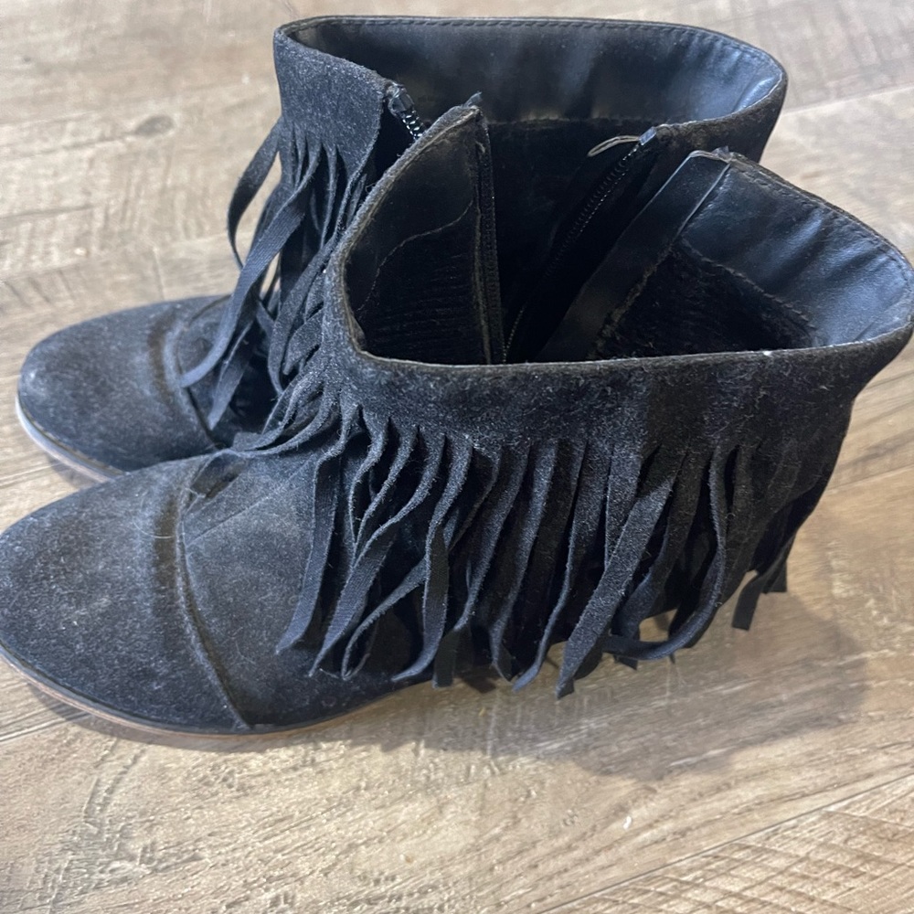Women’s black fringe booties